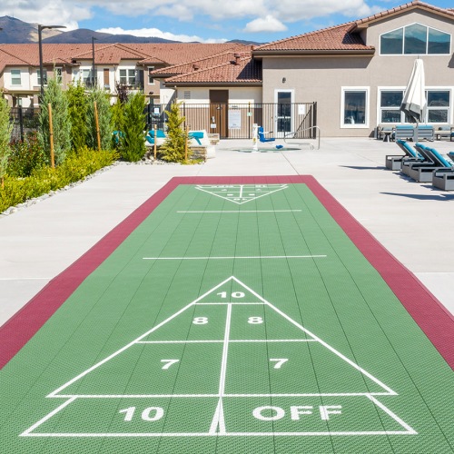 Large shuffleboard area located on the game deck next to the pool